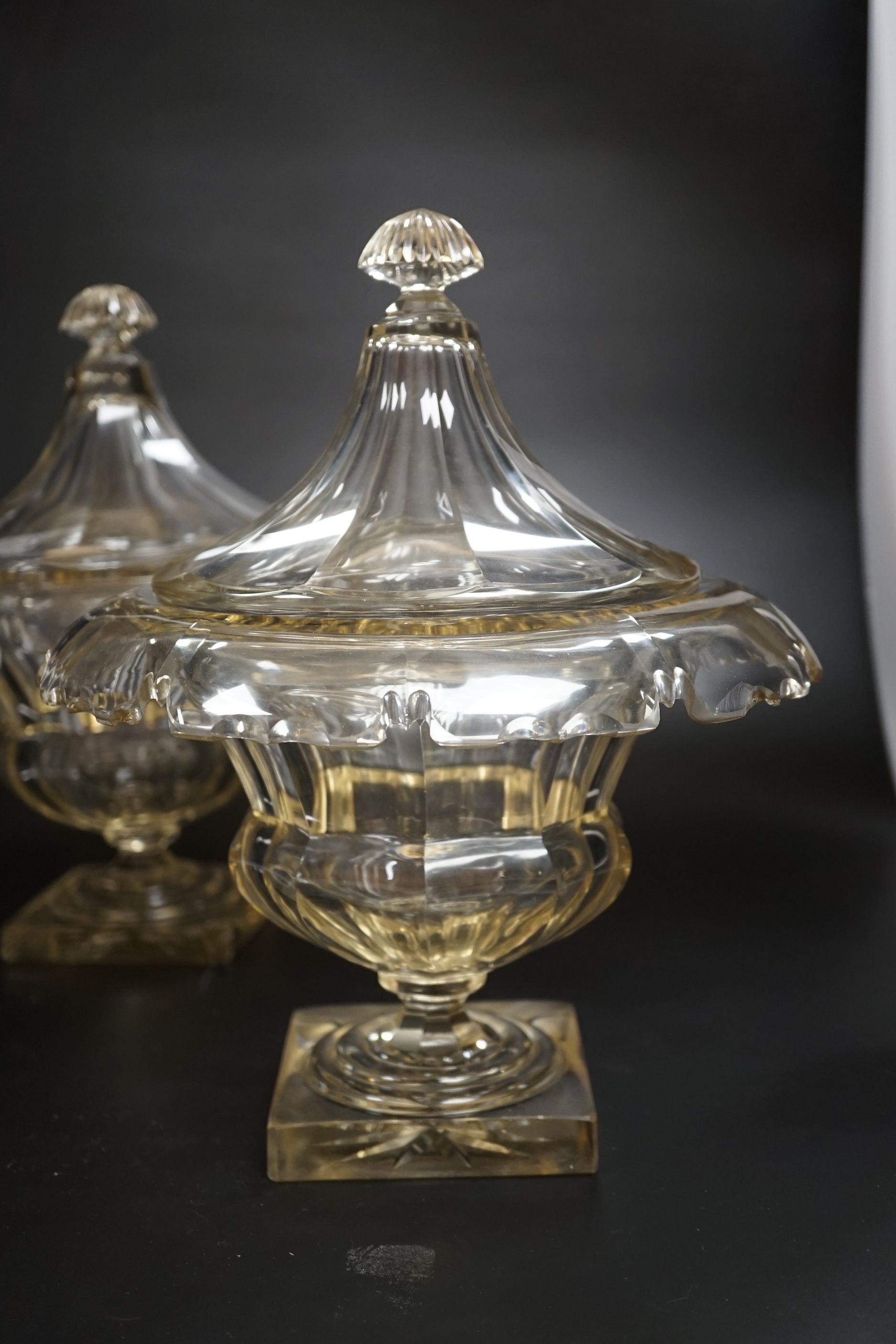 A pair of 19th century square base cut glass sweetmeat vases and covers, 29cm high